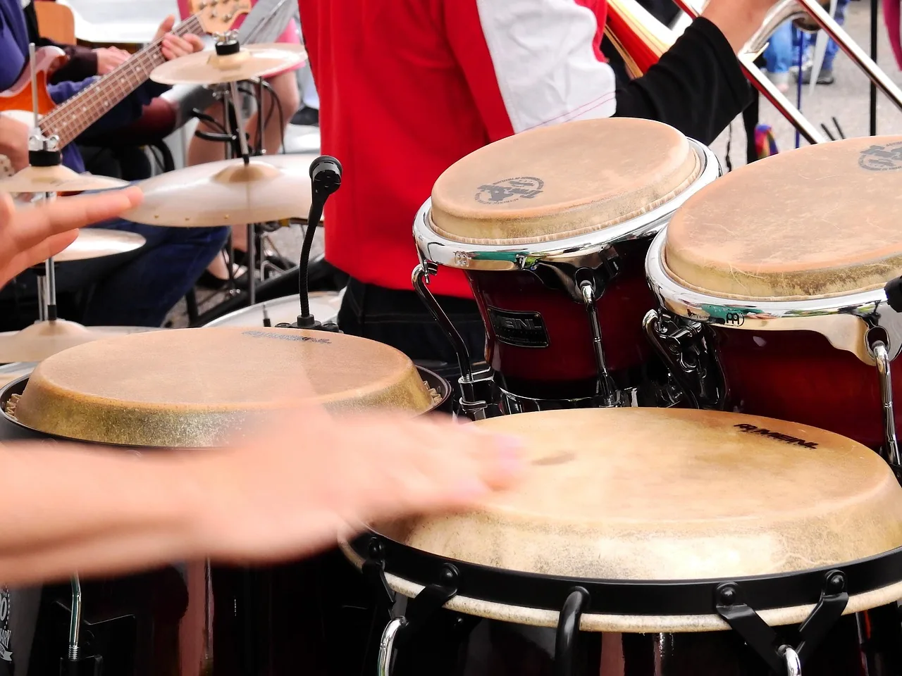 Percussion and congas being played in concert