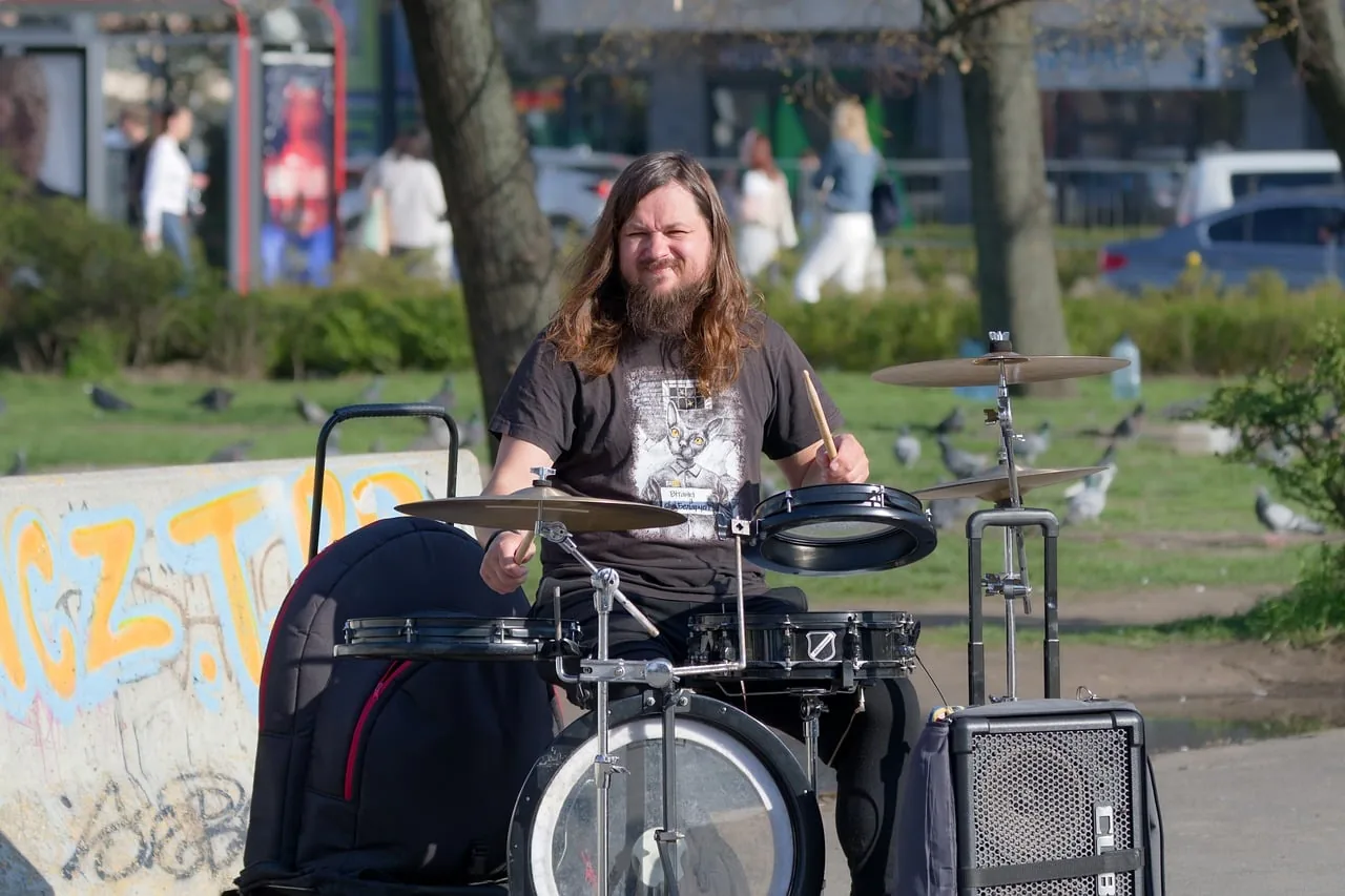 Drummer playing outdoors