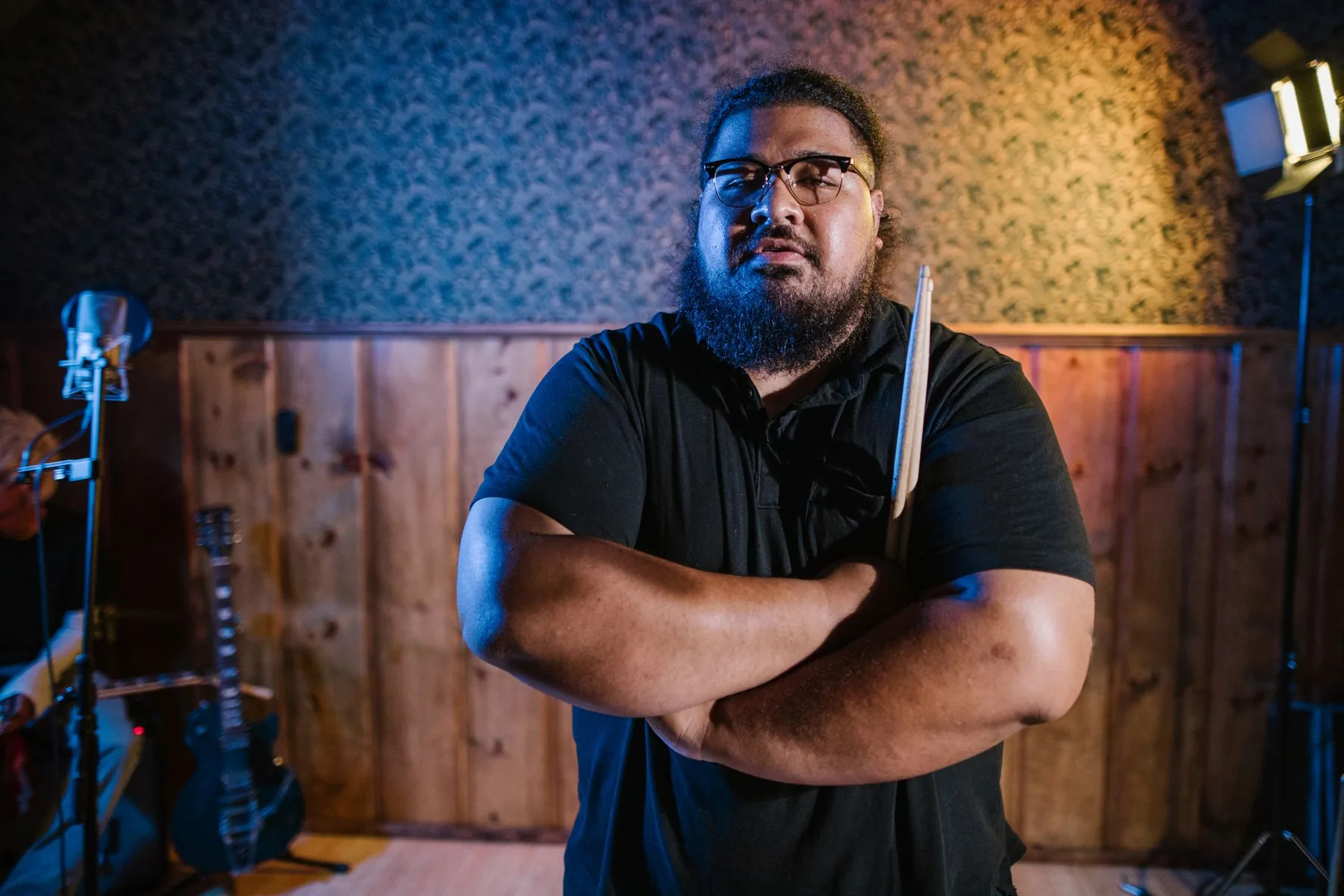 Portrait of a drummer in a music studio