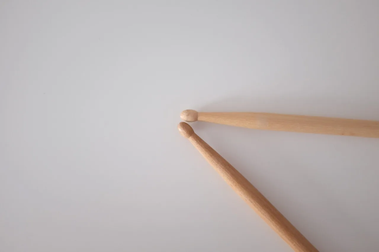 Two wooden drumsticks