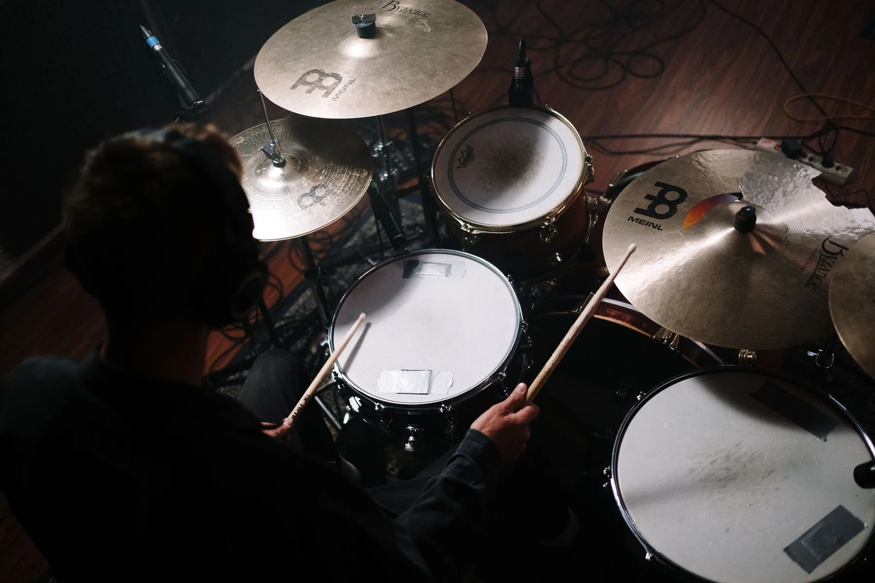 Adult drummer performing on stage Adult drummer performing on stage