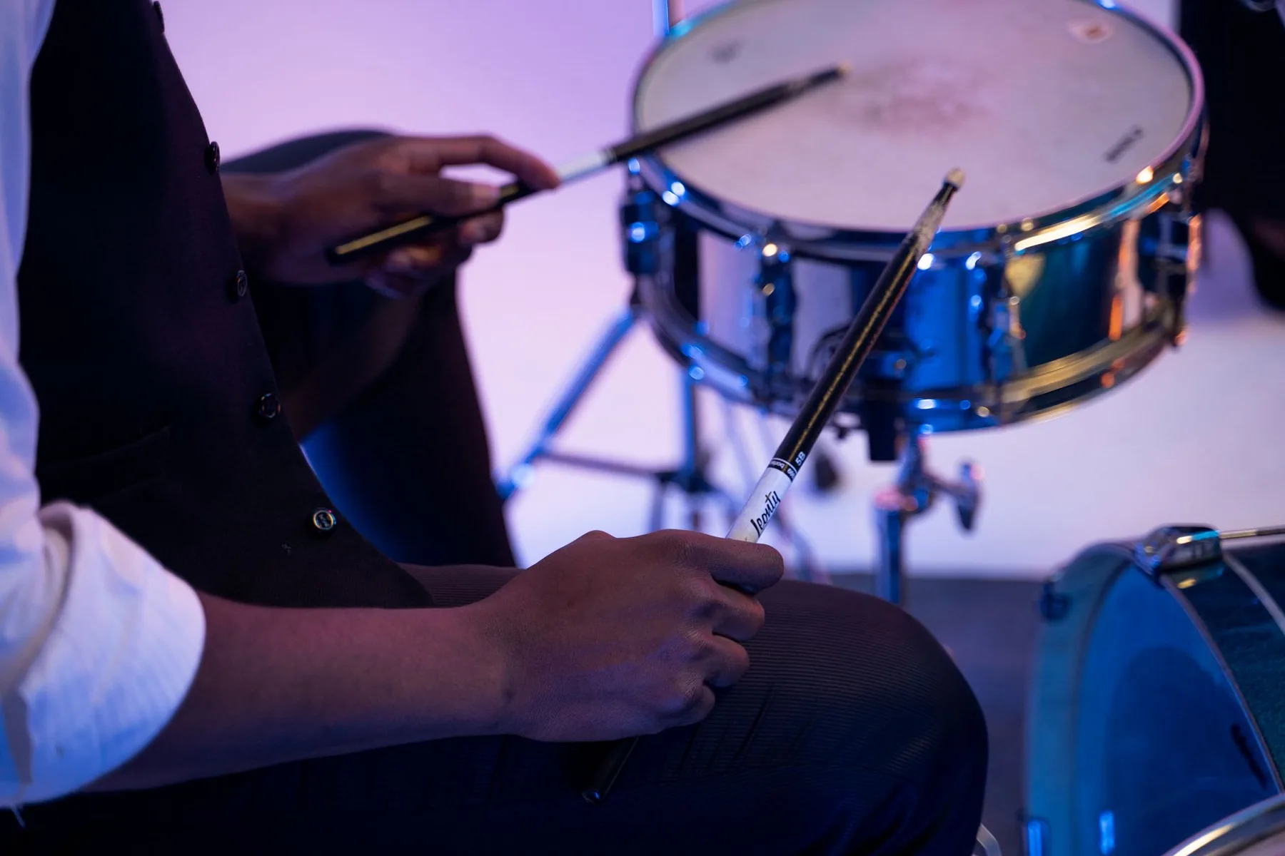 Musician holding drumsticks Musician holding drumsticks