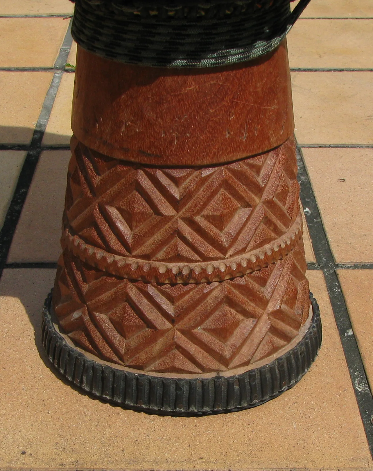 Traditional carved wooden djembe Traditional carved wooden djembe
