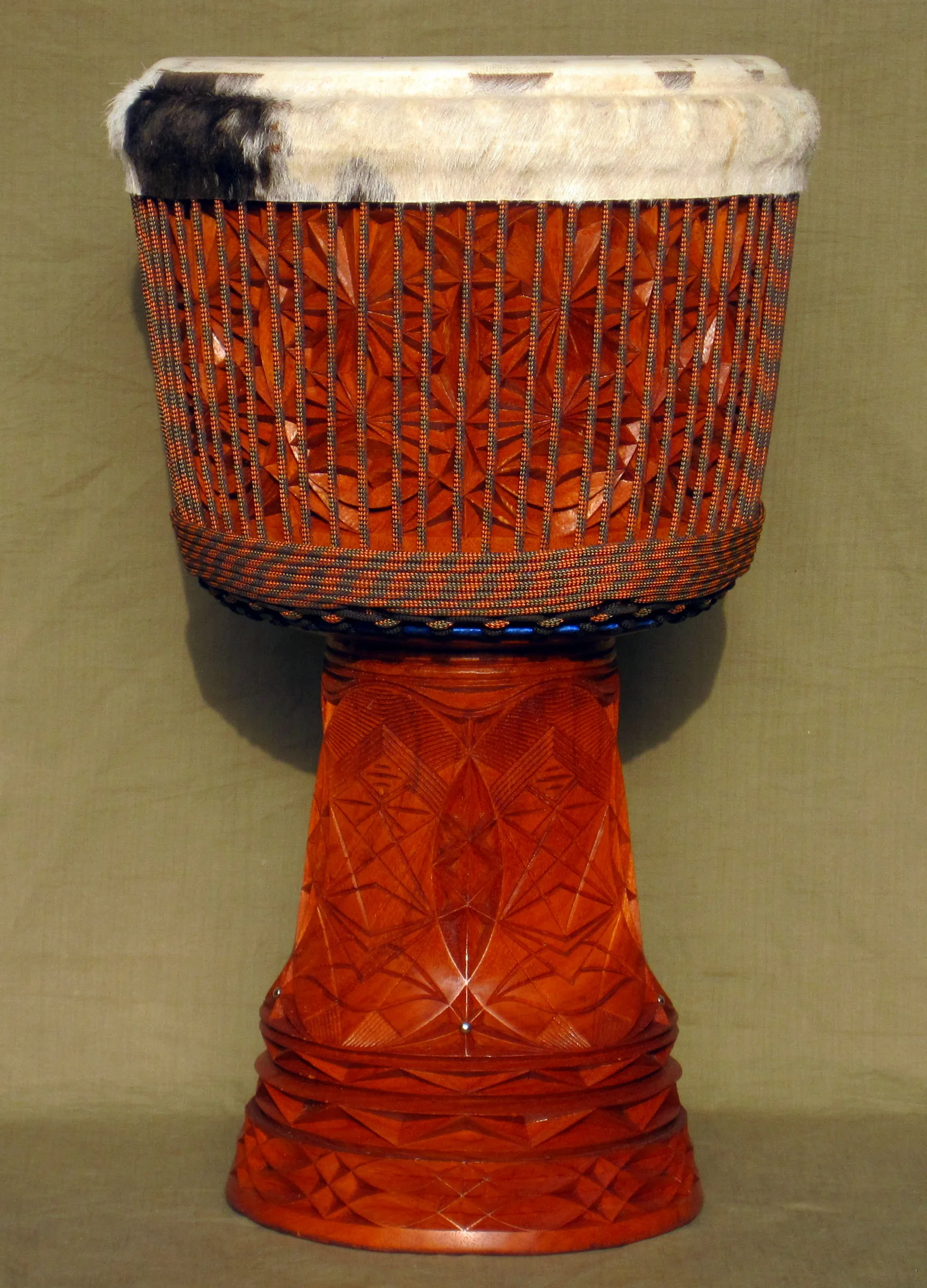 Traditional African djembe made of carved wood